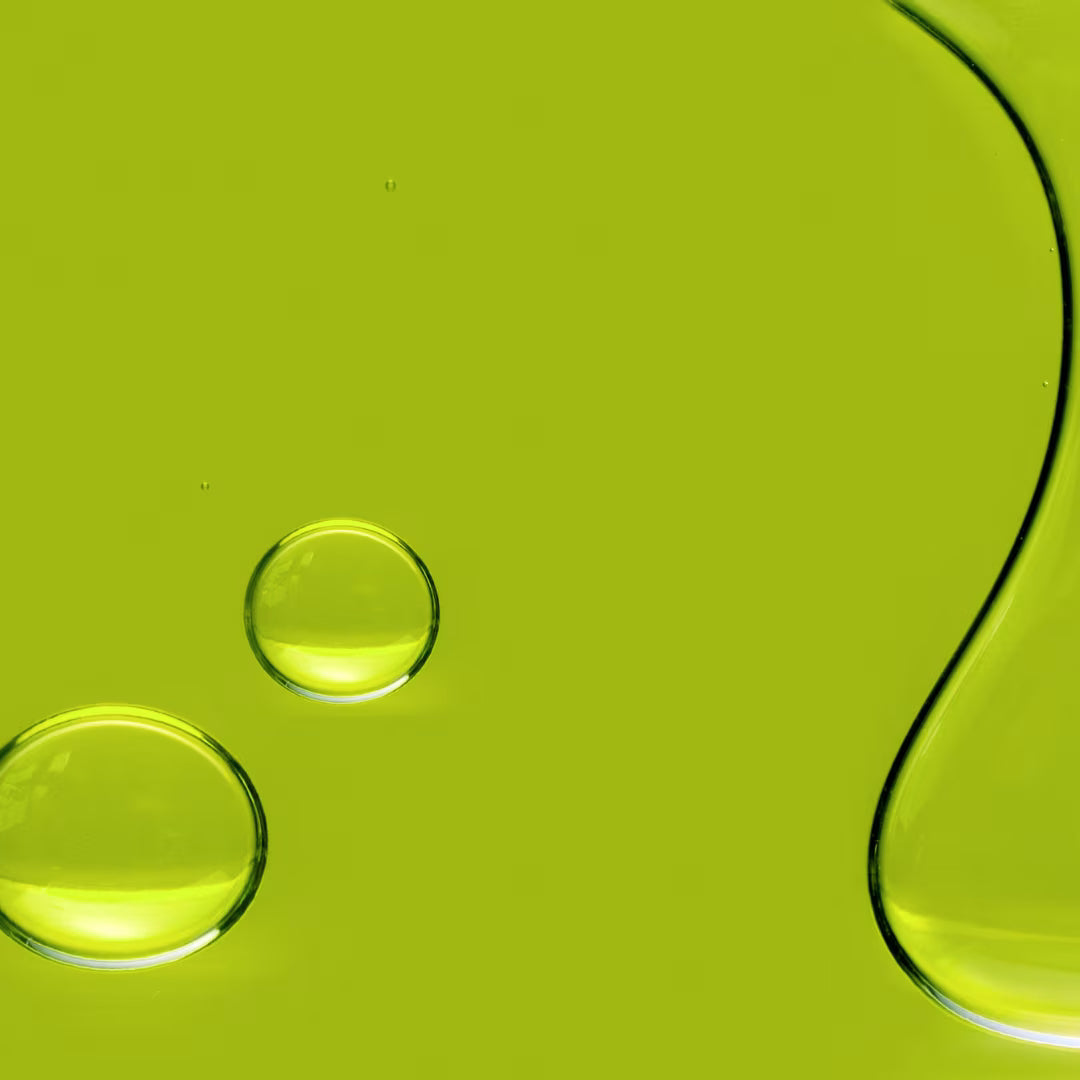 Close up of olive oil in glass
