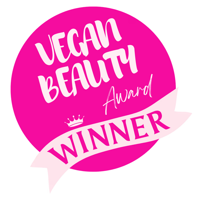 Vegan Beauty Award Winner badge with pink circle and white text