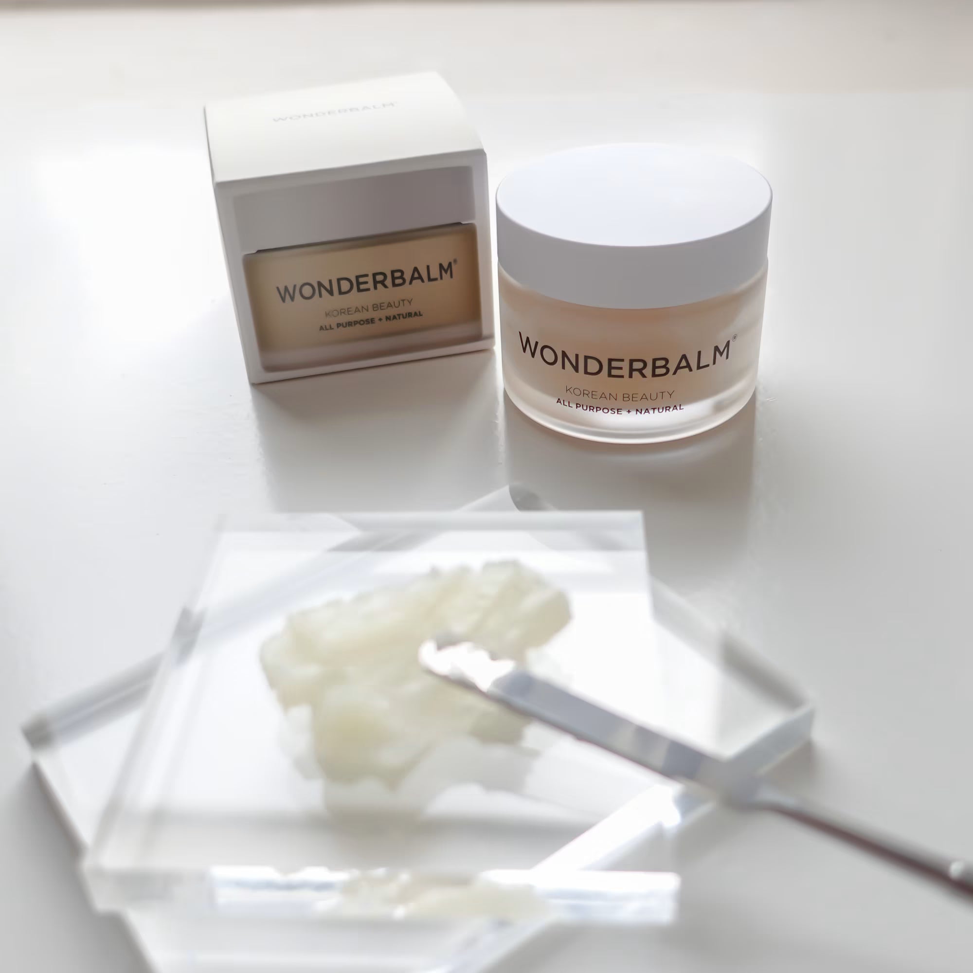Wonderbalm product with packaging and applicator