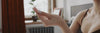 Using WONDERBALM on hands and arms in lifestyle video.