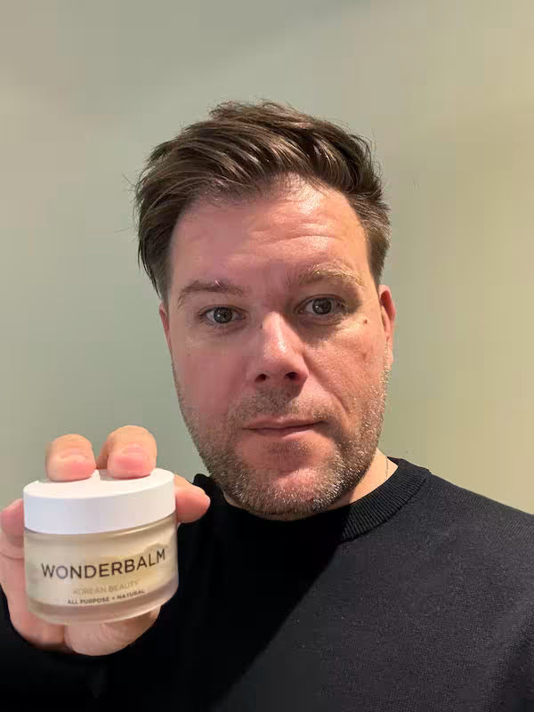 Founder, David with a jar of WONDERBALM.
